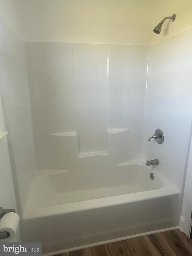 1807 Calvary Church Rd, Warsaw, VA 22572 - full bath with wood finished floors and shower / bathtub combination