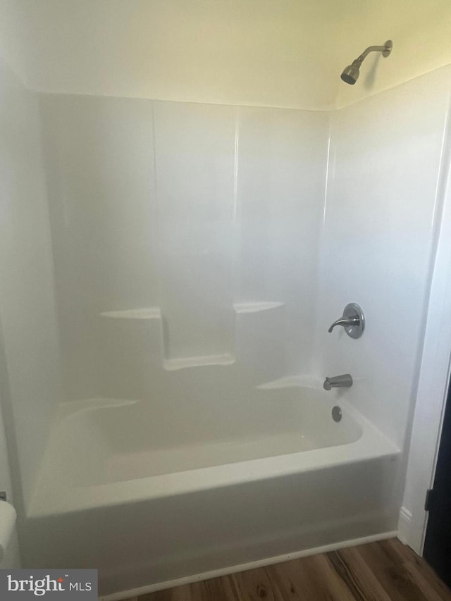 1807 Calvary Church Rd, Warsaw, VA 22572 - full bathroom with wood finished floors and  shower combination