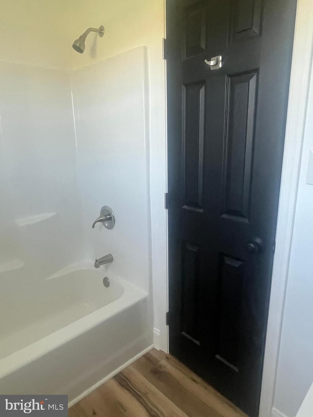 1807 Calvary Church Rd, Warsaw, VA 22572 - bathroom featuring wood finished floors and bathtub / shower combination
