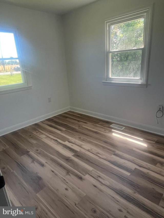 1807 Calvary Church Rd, Warsaw, VA 22572 - unfurnished room featuring dark wood-type flooring and baseboards