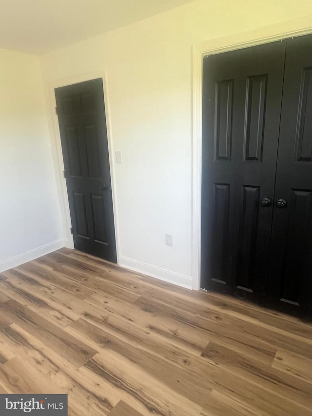 1807 Calvary Church Rd, Warsaw, VA 22572 - empty room featuring light wood-style flooring and baseboards
