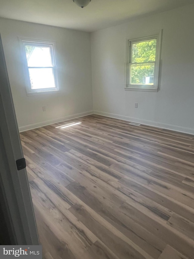 1807 Calvary Church Rd, Warsaw, VA 22572 - spare room with wood finished floors and baseboards