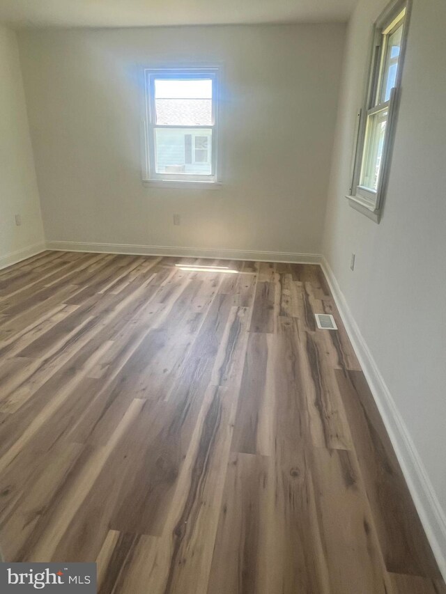 1807 Calvary Church Rd, Warsaw, VA 22572 - spare room featuring wood finished floors and baseboards