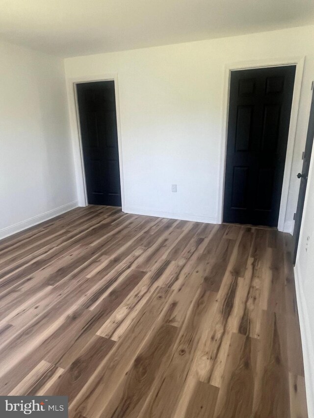 1807 Calvary Church Rd, Warsaw, VA 22572 - empty room featuring wood finished floors and baseboards
