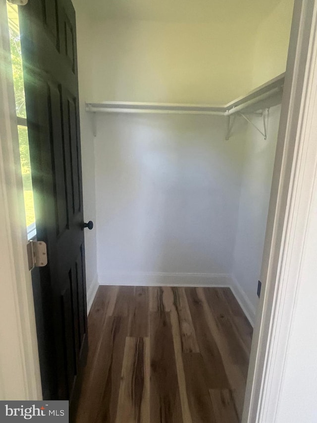 1807 Calvary Church Rd, Warsaw, VA 22572 - spacious closet with dark wood-style floors