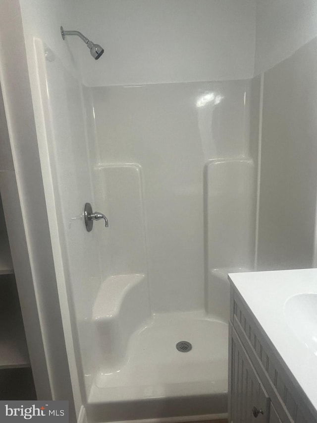 1807 Calvary Church Rd, Warsaw, VA 22572 - bathroom featuring a stall shower and vanity