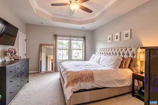 1509 Delphi Ln, Charlottesville, VA 22911 - bedroom with a tray ceiling, light colored carpet, ornamental molding, and a ceiling fan