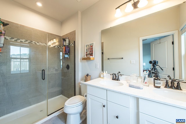 1509 Delphi Ln, Charlottesville, VA 22911 - bathroom featuring a shower stall, double vanity, and toilet