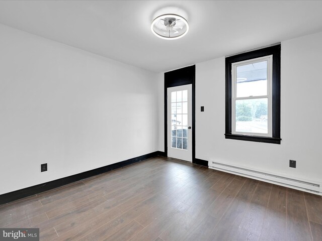 1420 W Walnut St, Ashland, PA 17921 - unfurnished room with a baseboard radiator, wood finished floors, and baseboards