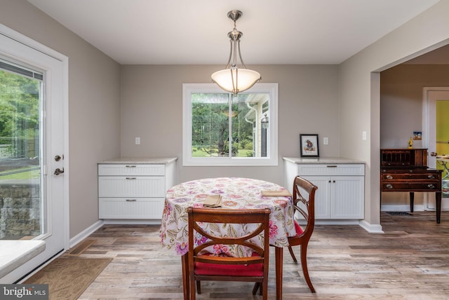 13 Deerfield Ln, Rehoboth Beach, DE 19971 - dining space featuring light wood-style flooring and baseboards