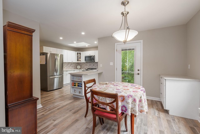 13 Deerfield Ln, Rehoboth Beach, DE 19971 - dining space with light wood-style flooring, recessed lighting, and baseboards