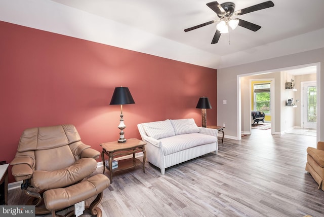 13 Deerfield Ln, Rehoboth Beach, DE 19971 - living area with wood finished floors, baseboards, and ceiling fan