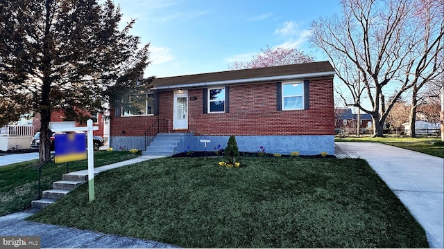 8802 Ashford Rd, Parkville, MD 21234 - ranch-style home with a front yard and brick siding