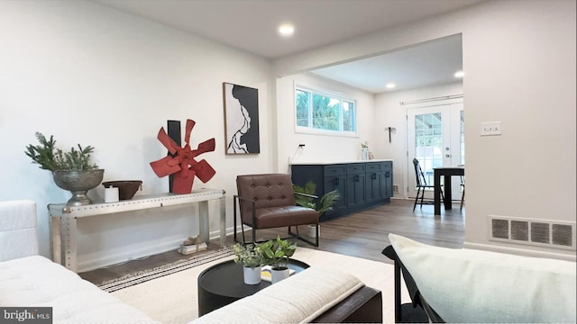 8802 Ashford Rd, Parkville, MD 21234 - living area with wood finished floors, recessed lighting, and baseboards
