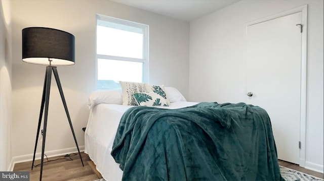 8802 Ashford Rd, Parkville, MD 21234 - bedroom with wood finished floors and baseboards