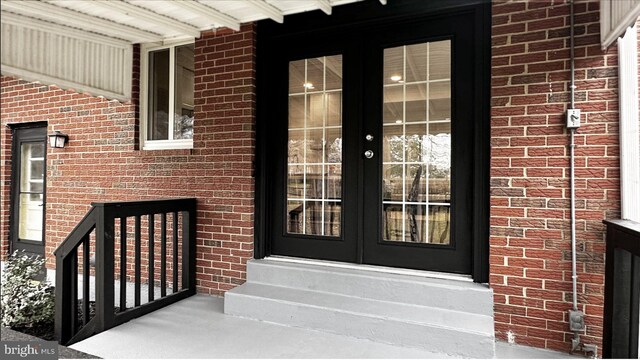 8802 Ashford Rd, Parkville, MD 21234 - view of exterior entry with french doors and brick siding