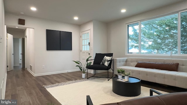 8802 Ashford Rd, Parkville, MD 21234 - sitting room with wood finished floors, recessed lighting, and baseboards