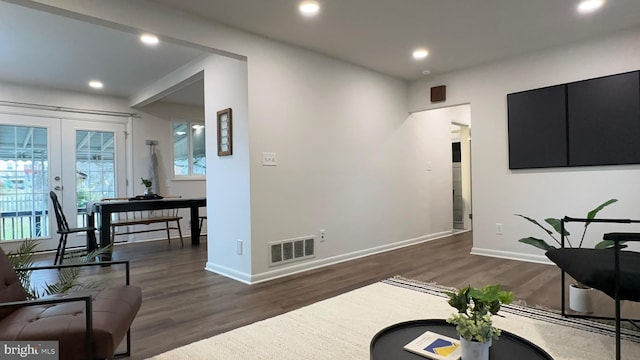 8802 Ashford Rd, Parkville, MD 21234 - living area with french doors, wood finished floors, recessed lighting, and baseboards