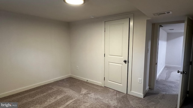 8802 Ashford Rd, Parkville, MD 21234 - unfurnished bedroom featuring carpet and baseboards