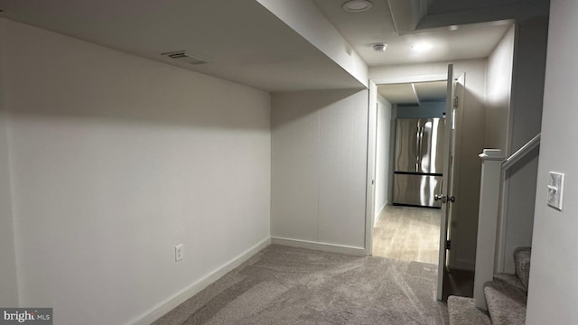 8802 Ashford Rd, Parkville, MD 21234 - hall with baseboards, carpet floors, and stairs