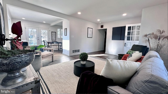 8802 Ashford Rd, Parkville, MD 21234 - living area featuring french doors, wood finished floors, recessed lighting, and baseboards
