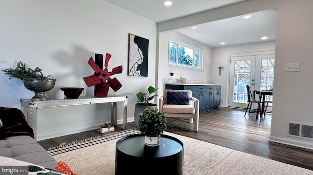 8802 Ashford Rd, Parkville, MD 21234 - living area with french doors, dark wood-style floors, baseboards, and recessed lighting