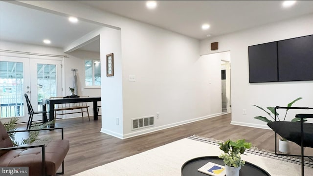 8802 Ashford Rd, Parkville, MD 21234 - living room featuring french doors, wood finished floors, recessed lighting, and baseboards