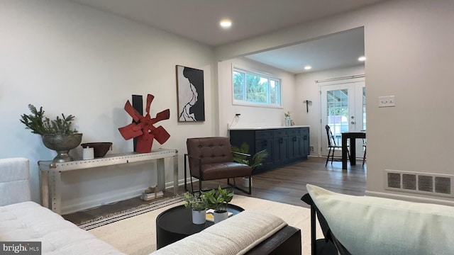 8802 Ashford Rd, Parkville, MD 21234 - living room with wood finished floors, recessed lighting, and baseboards