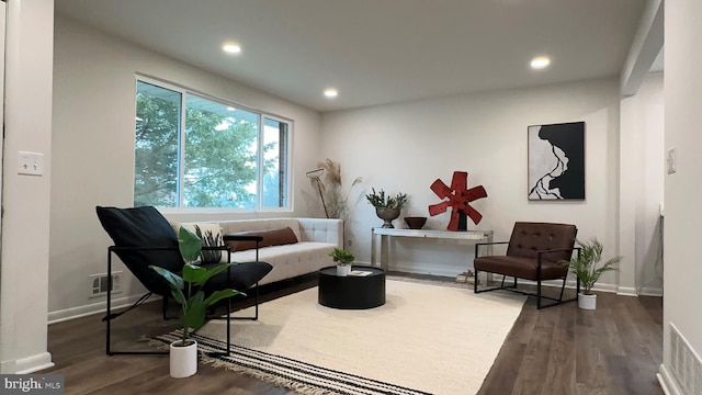 8802 Ashford Rd, Parkville, MD 21234 - living area featuring dark wood-type flooring, baseboards, and recessed lighting
