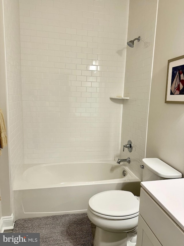 full bath featuring toilet,  shower combination, and vanity