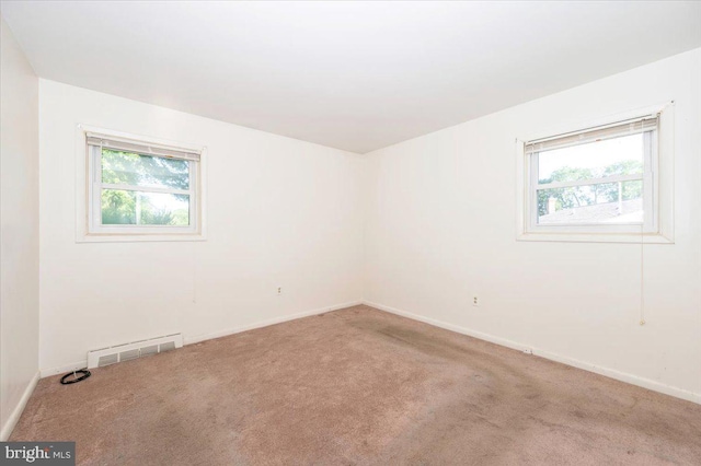 1426 W 11th St, Frederick, MD 21702 - carpeted spare room featuring healthy amount of natural light and baseboards