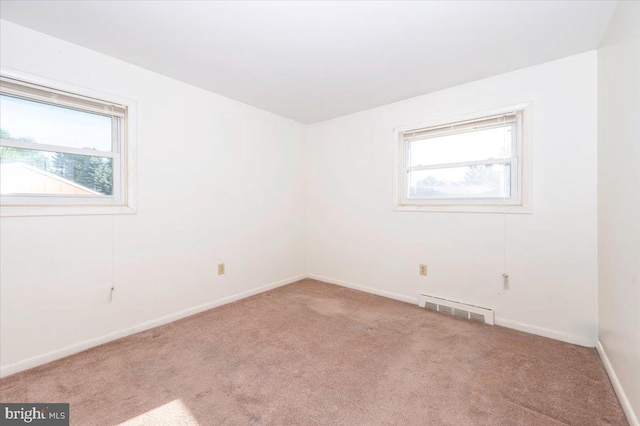 1426 W 11th St, Frederick, MD 21702 - empty room with carpet floors, plenty of natural light, and baseboards