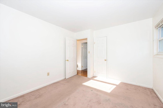 1426 W 11th St, Frederick, MD 21702 - unfurnished bedroom featuring carpet and baseboards