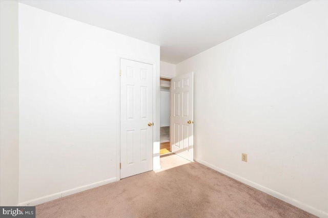 1426 W 11th St, Frederick, MD 21702 - empty room featuring carpet flooring and baseboards