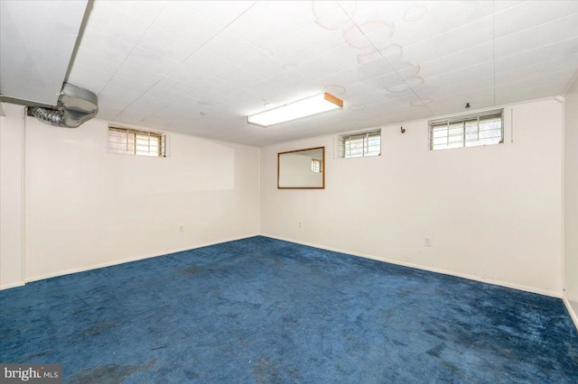 1426 W 11th St, Frederick, MD 21702 - below grade area with dark colored carpet, plenty of natural light, and baseboards