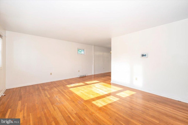1426 W 11th St, Frederick, MD 21702 - spare room with light wood-type flooring and baseboards