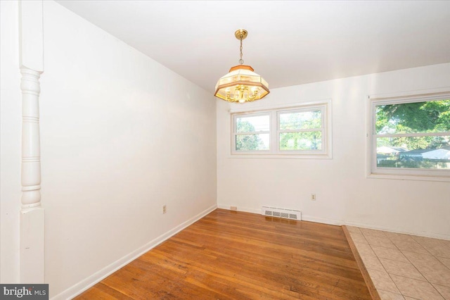 1426 W 11th St, Frederick, MD 21702 - spare room featuring baseboards and light wood-style floors