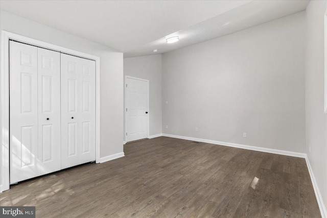 228 Doe Trl, Winchester, VA 22602 - unfurnished bedroom with wood finished floors, baseboards, and a closet