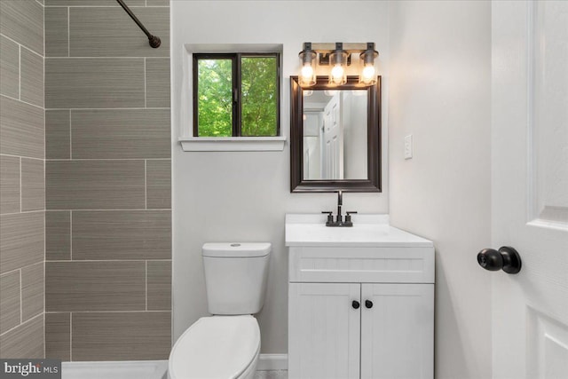 228 Doe Trl, Winchester, VA 22602 - full bathroom with toilet, vanity, and tiled shower