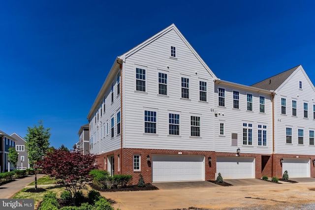5 Graze Way, Carlisle, PA 17015 - multi unit property featuring brick siding, an attached garage, and driveway