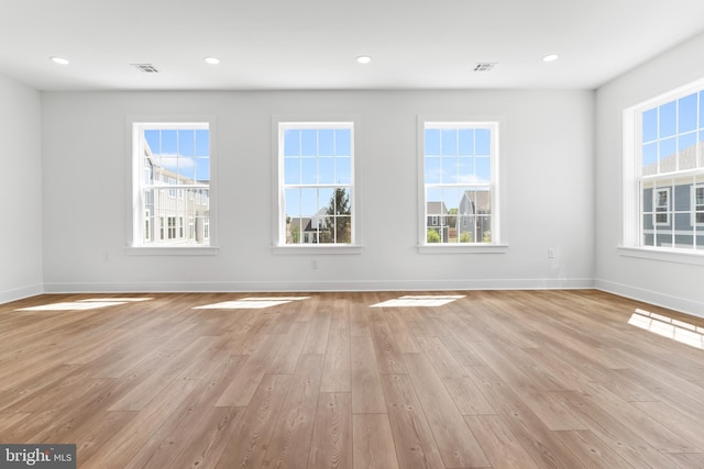 5 Graze Way, Carlisle, PA 17015 - unfurnished living room with light wood-style floors, healthy amount of natural light, baseboards, and recessed lighting