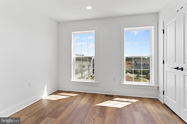 5 Graze Way, Carlisle, PA 17015 - unfurnished room with plenty of natural light, baseboards, wood finished floors, and recessed lighting