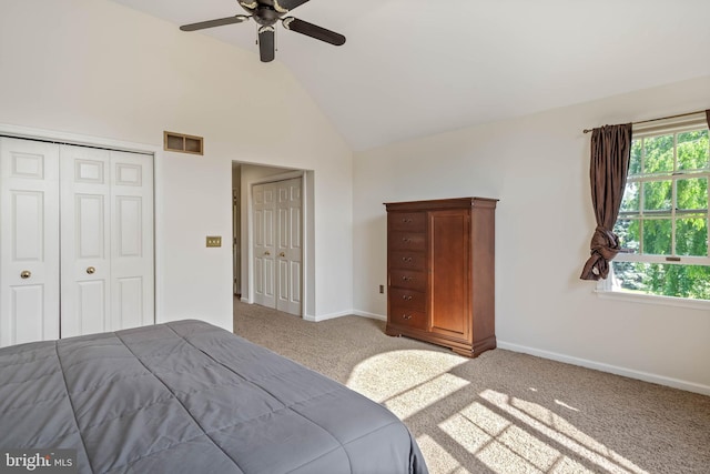 123 Nantucket Dr, Middletown, DE 19709 - bedroom with light colored carpet, multiple closets, high vaulted ceiling, baseboards, and a ceiling fan