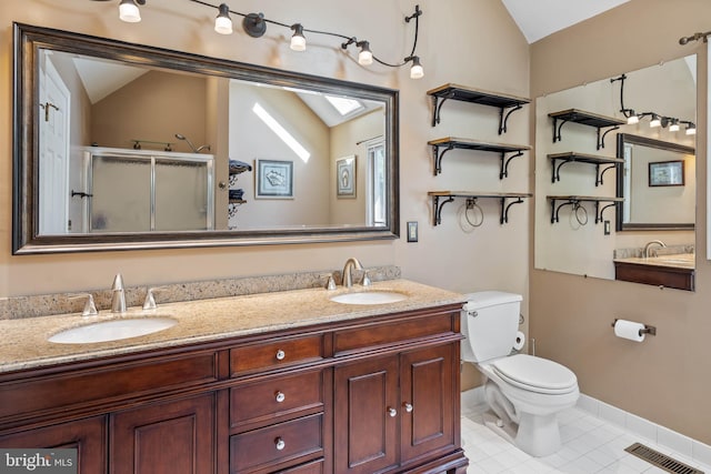 123 Nantucket Dr, Middletown, DE 19709 - bathroom with vaulted ceiling, a stall shower, toilet, tile patterned flooring, and double vanity