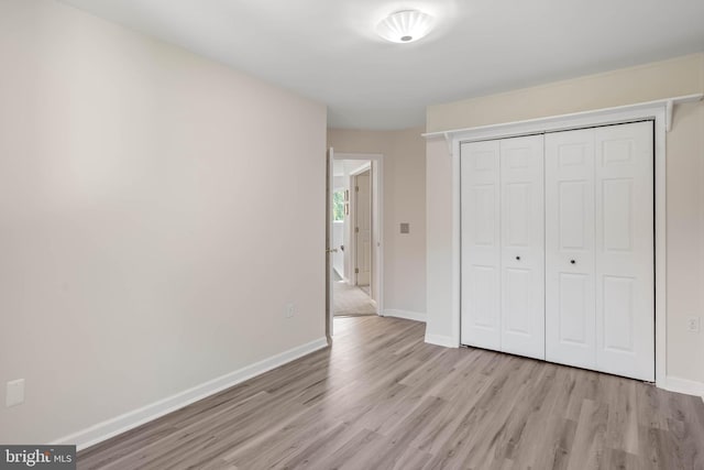 123 Nantucket Dr, Middletown, DE 19709 - unfurnished bedroom featuring light wood finished floors, baseboards, and a closet