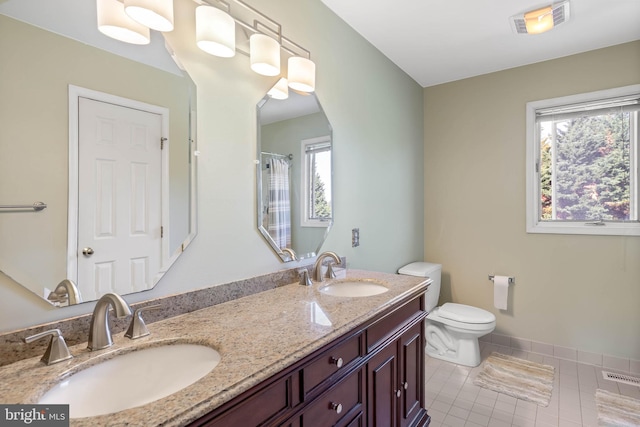 123 Nantucket Dr, Middletown, DE 19709 - full bath featuring tile patterned flooring, toilet, double vanity, and a shower with curtain
