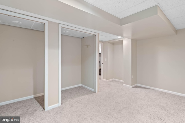 123 Nantucket Dr, Middletown, DE 19709 - finished below grade area featuring carpet floors, a paneled ceiling, and baseboards