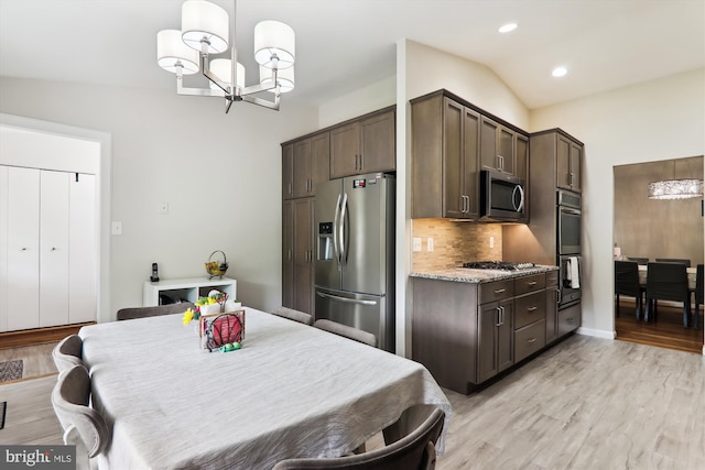 kitchen with stainless steel appliances, a chandelier, dark brown cabinetry, backsplash, and recessed lighting