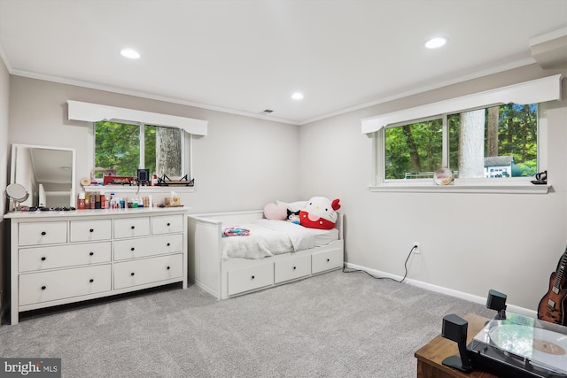 carpeted bedroom featuring crown molding, recessed lighting, and baseboards