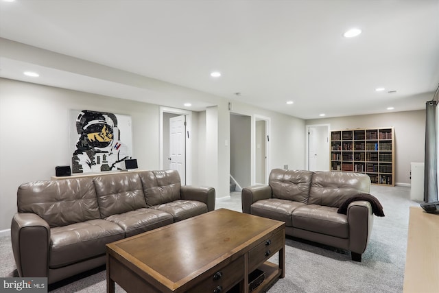 living area with light colored carpet, recessed lighting, stairway, and baseboards